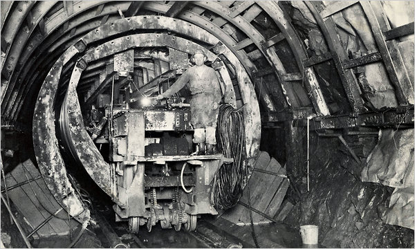 Fig 6. Working on the Rondout-West Branch Tunnel of the Delaware Aqueduct in 1942. Cracks have caused flooding in Wawarsing, N.Y., in Ulster County. 